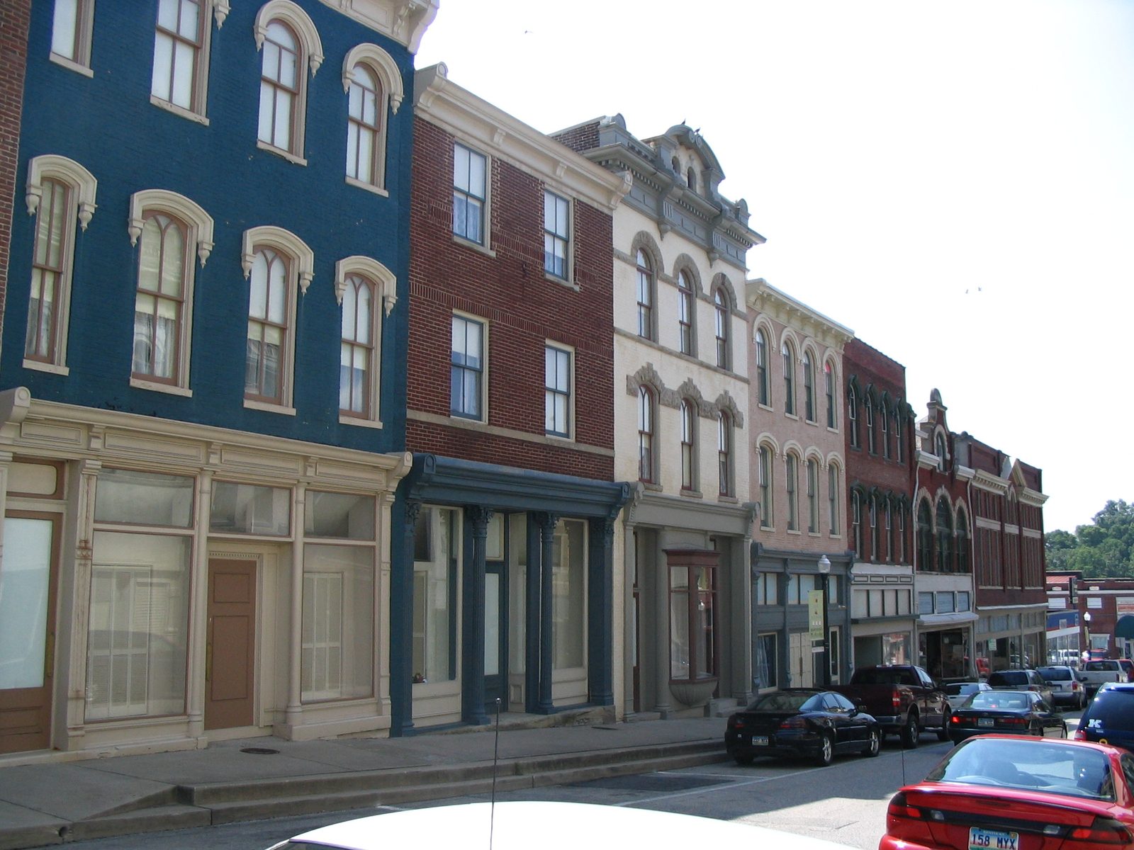 Restored Victorian-era brick storefronts on a historic downtown Mount Sterling, Kentucky street